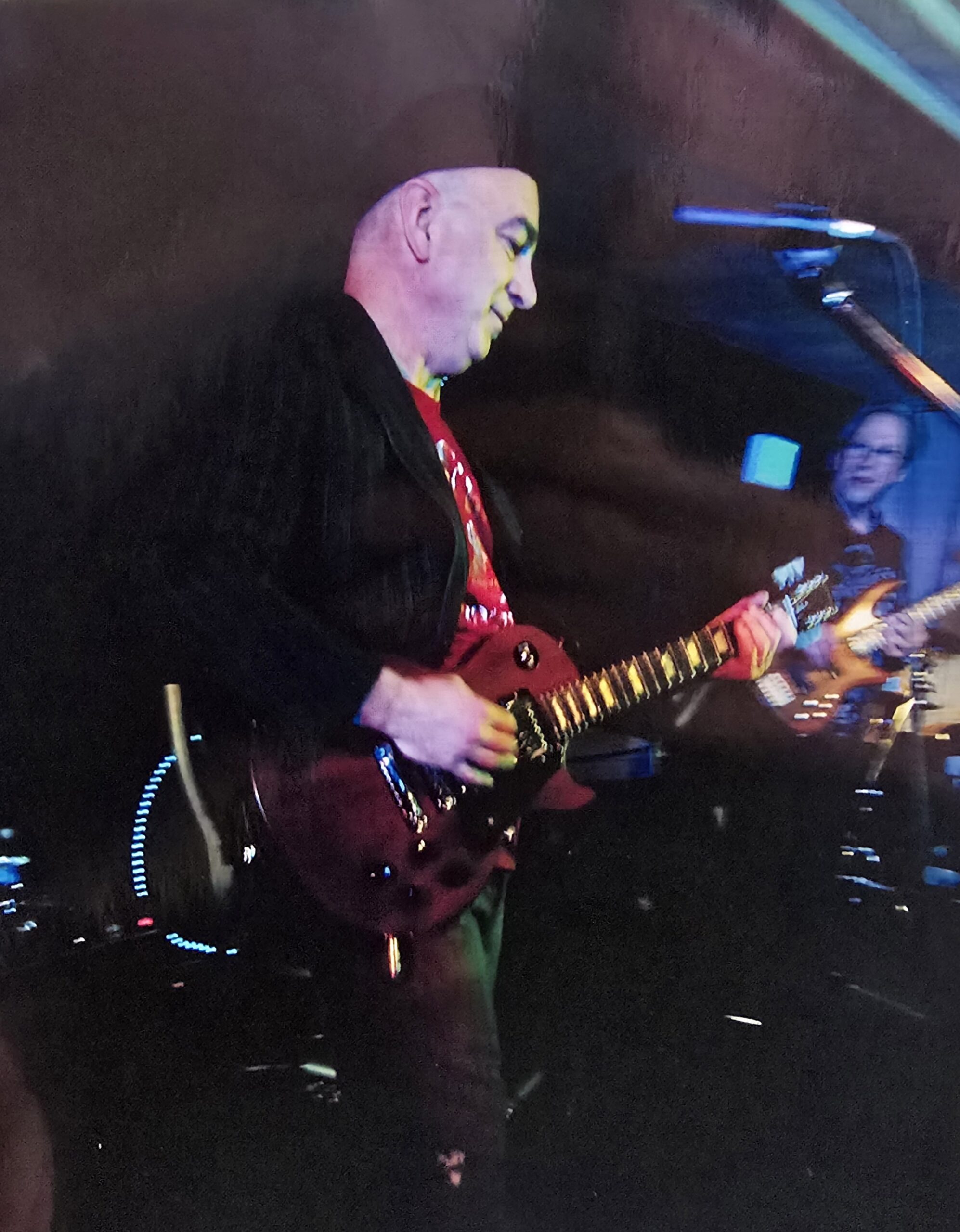 Mike Sudak performing live on guitar